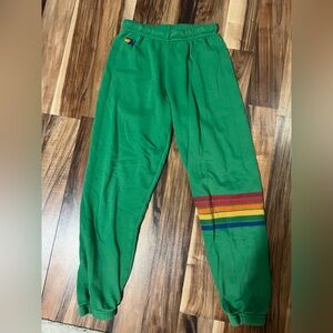 Aviator Nation Green Pants with Rainbow Stripes
